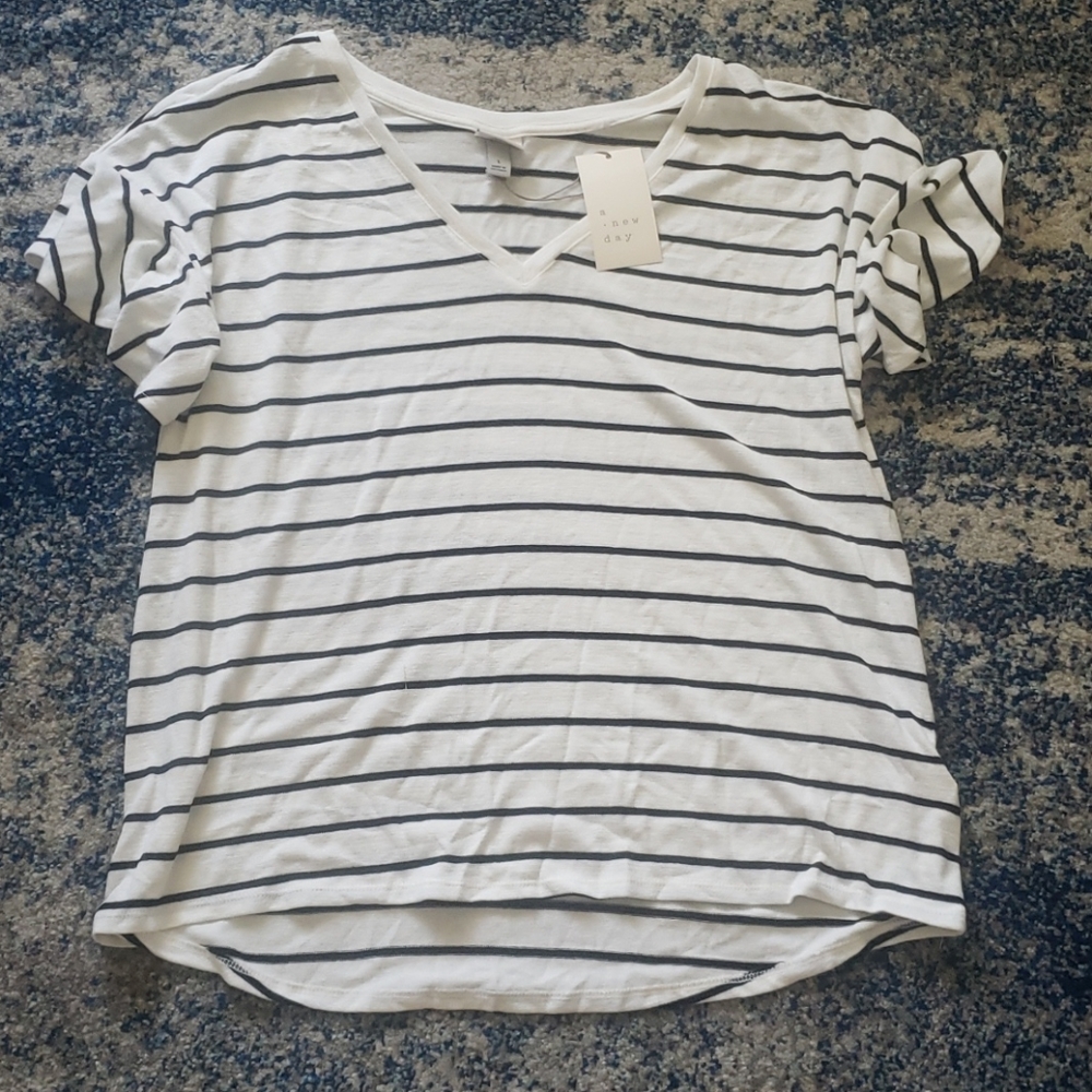 White and black striped shirt with ruffle sleeve